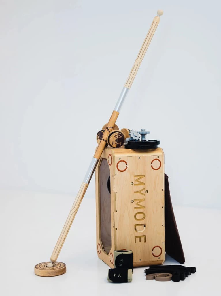 The MYMODE apparatus: handcrafted wooden box, staff, disk, weights, and bands